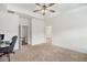 Spacious carpeted bedroom featuring neutral colors and ample natural light at 461 Barnwood Dr, Rockmart, GA 30153