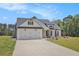 Charming single-Gathering home featuring a 2-car garage, craftsman design, and beautiful landscaping at 461 Barnwood Dr, Rockmart, GA 30153