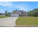 Charming single-Gathering home featuring a 2-car garage, craftsman design, and beautiful landscaping at 461 Barnwood Dr, Rockmart, GA 30153