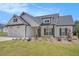 Beautiful single-Gathering home with a two-car garage, craftsman features, and well-manicured lawn at 461 Barnwood Dr, Rockmart, GA 30153