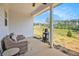 Inviting covered patio featuring outdoor furniture and offering views of the surrounding landscape at 461 Barnwood Dr, Rockmart, GA 30153