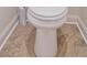 Close up of a toilet and toilet brush at 461 Barnwood Dr, Rockmart, GA 30153