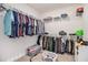 Walk-in closet featuring organized storage for clothing at 461 Barnwood Dr, Rockmart, GA 30153