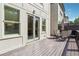 A well-maintained wooden deck accessible through sliding glass doors, perfect for outdoor relaxation at 502 Abbington River Ln, Atlanta, GA 30339