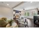 Comfortable main bedroom featuring an accent wall and a seating area at 502 Abbington River Ln, Atlanta, GA 30339