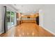 Bright kitchen and dining area featuring wood floors, and stainless steel appliances at 5937 Sharp Se Dr, Mableton, GA 30126
