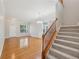 Open floor plan with hardwood floors, classic wainscoting, a stairway, and bright natural light at 5937 Sharp Se Dr, Mableton, GA 30126