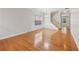 Open floor plan with hardwood floors, natural light, classic wainscoting and a staircase at 5937 Sharp Se Dr, Mableton, GA 30126