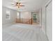 Spacious loft area featuring neutral carpet, soft gray walls, and access to multiple bedrooms at 5937 Sharp Se Dr, Mableton, GA 30126