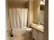 Cozy bathroom with a bathtub, a vanity, and a well-lit mirror at 964 Village View Cir, Loganville, GA 30052