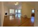 Spacious living room with hardwood floors, fireplace, and an open layout with natural light at 964 Village View Cir, Loganville, GA 30052