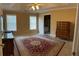 Large main bedroom featuring a trey ceiling, neutral paint, and lots of natural light at 964 Village View Cir, Loganville, GA 30052