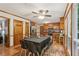 Bright dining area with hardwood floors, a large table, and views of the well-maintained kitchen with stainless appliances at 1369 Willowbrook Sw Dr, Marietta, GA 30064