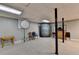 Spacious basement with lighting setup and space for creative projects or storage at 262 Somerset Ct, Lawrenceville, GA 30044