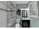 Stylish bathroom with a glass-enclosed shower and modern fixtures at 262 Somerset Ct, Lawrenceville, GA 30044