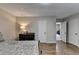 Bedroom features hardwood floors, a dark dresser, neutral paint, and closet at 262 Somerset Ct, Lawrenceville, GA 30044