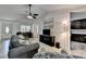 Open-concept living room with view to the kitchen and entry way at 262 Somerset Ct, Lawrenceville, GA 30044