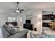 Open-concept living room with view to the kitchen. Plenty of natural light at 262 Somerset Ct, Lawrenceville, GA 30044