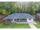 A lovely home featuring a new roof, beautiful lawn, and landscaped backyard perfect for outdoor activities and relaxation at 2773 Fairlane Dr, Atlanta, GA 30354