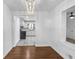 A bright dining area leads to an updated kitchen with modern finishes and fixtures at 2773 Fairlane Dr, Atlanta, GA 30354