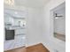 Kitchen featuring stainless steel appliances and hardwood floors flowing into the adjacent room at 2773 Fairlane Dr, Atlanta, GA 30354