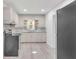 Well-lit kitchen features modern appliances, granite countertops, white cabinets, and an open design at 2773 Fairlane Dr, Atlanta, GA 30354