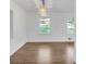 Hardwood floors, fresh paint and natural light compliment this comfortable living room at 2773 Fairlane Dr, Atlanta, GA 30354