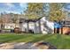 Spacious backyard with a small wood deck, ideal for outdoor gatherings and relaxation at 2912 Palm Dr, East Point, GA 30344