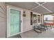 Inviting front porch with seating area to relax and enjoy the neighborhood views at 2912 Palm Dr, East Point, GA 30344