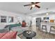 Bright and airy living room with open floor plan and eat-in kitchen with bar seating at 2912 Palm Dr, East Point, GA 30344