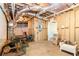 Unfinished basement with exposed beams, and a door leading to other spaces of the house at 404 Summerchase Way, Woodstock, GA 30189