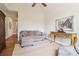 Inviting living room featuring a comfortable couch, stylish table, and hardwood floors at 5172 Roswell Rd, Marietta, GA 30062