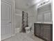 The bright bathroom includes a shower/tub combo, toilet, and vanity with storage at 1510 Silver Mist Cir, Powder Springs, GA 30127
