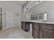 Bright primary bathroom features a large vanity with double sinks and walk-in shower at 1510 Silver Mist Cir, Powder Springs, GA 30127
