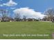Beautifully maintained lawn with a play area and view of the neighborhood homes at 1510 Silver Mist Cir, Powder Springs, GA 30127