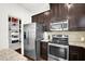Kitchen features stainless steel appliances, granite counters and a walk-in pantry at 2333 White Oak Se Bnd, Smyrna, GA 30080