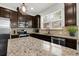 Beautiful kitchen with stainless steel appliances and granite countertops with view to the backyard at 2333 White Oak Se Bnd, Smyrna, GA 30080