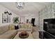Spacious living room with cozy seating, decorative wall accents, and modern lighting fixtures at 2333 White Oak Se Bnd, Smyrna, GA 30080