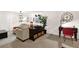 Spacious living area with stylish decor, comfortable seating, and a dedicated workspace at 2333 White Oak Se Bnd, Smyrna, GA 30080