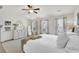 Bright and airy bedroom featuring a plush bed, trey ceiling, and neutral decor, creating a relaxing retreat at 2333 White Oak Se Bnd, Smyrna, GA 30080