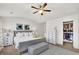 Charming main bedroom offers a comfortable bed, neutral colors, and a large closet, ideal for rest and relaxation at 2333 White Oak Se Bnd, Smyrna, GA 30080