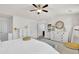Inviting main bedroom features a well-dressed bed, plentiful windows, and white dressers, creating a relaxing retreat at 2333 White Oak Se Bnd, Smyrna, GA 30080