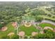 High-angle shot of baseball and multi-use sports fields with meticulously maintained grass, surrounded by mature trees and parking areas at 4601 Tall Pines Nw Dr, Atlanta, GA 30327