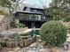 A sprawling backyard with pool, stone accents, and contemporary exterior at 4601 Tall Pines Nw Dr, Atlanta, GA 30327