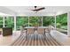 Bright dining area with a large window offering views of the backyard and natural light at 4601 Tall Pines Nw Dr, Atlanta, GA 30327
