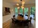 The dining area features a stylish chandelier and ample space for Gathering gatherings at 4601 Tall Pines Nw Dr, Atlanta, GA 30327