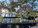 Modern black home exterior featuring multiple levels, large windows, and outdoor decks with nature views at 4601 Tall Pines Nw Dr, Atlanta, GA 30327