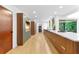 Spacious kitchen featuring custom cabinetry, long island, modern appliances, and an abundance of natural light at 4601 Tall Pines Nw Dr, Atlanta, GA 30327