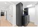 The well-lit laundry room offers modern appliances and lots of cabinet space at 4601 Tall Pines Nw Dr, Atlanta, GA 30327