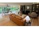 Spacious living room with a fireplace, built-in shelving, and an adjacent dining area at 4601 Tall Pines Nw Dr, Atlanta, GA 30327